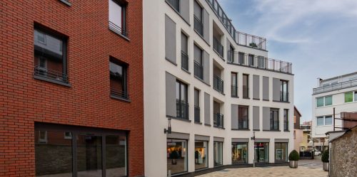Projekte_Bilder_unten_Rompel 04 Mehrstöckige Wohnhäuser mit Ladengeschäft Wohnhaus mit Ladengeschäft auf Quartiersplatz Rompel-Carré Oberursel