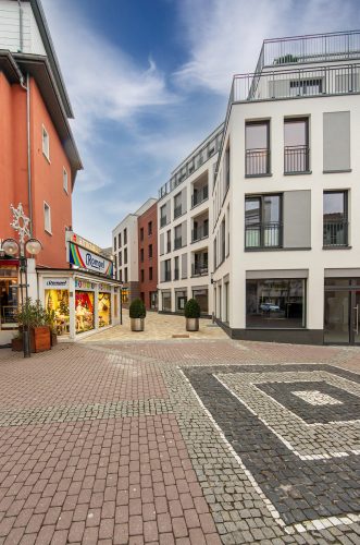 Projekte_Slider_Gallery_Rompel 05 Wohnhäuser mit Wohnungen und Ladengeschäft mit Quartiersplatz Rompel-Carré Oberursel